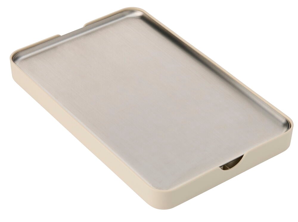 Kylbricka 41x27x4 cm med borstad silverfärgad metalltopp och beige plastram.