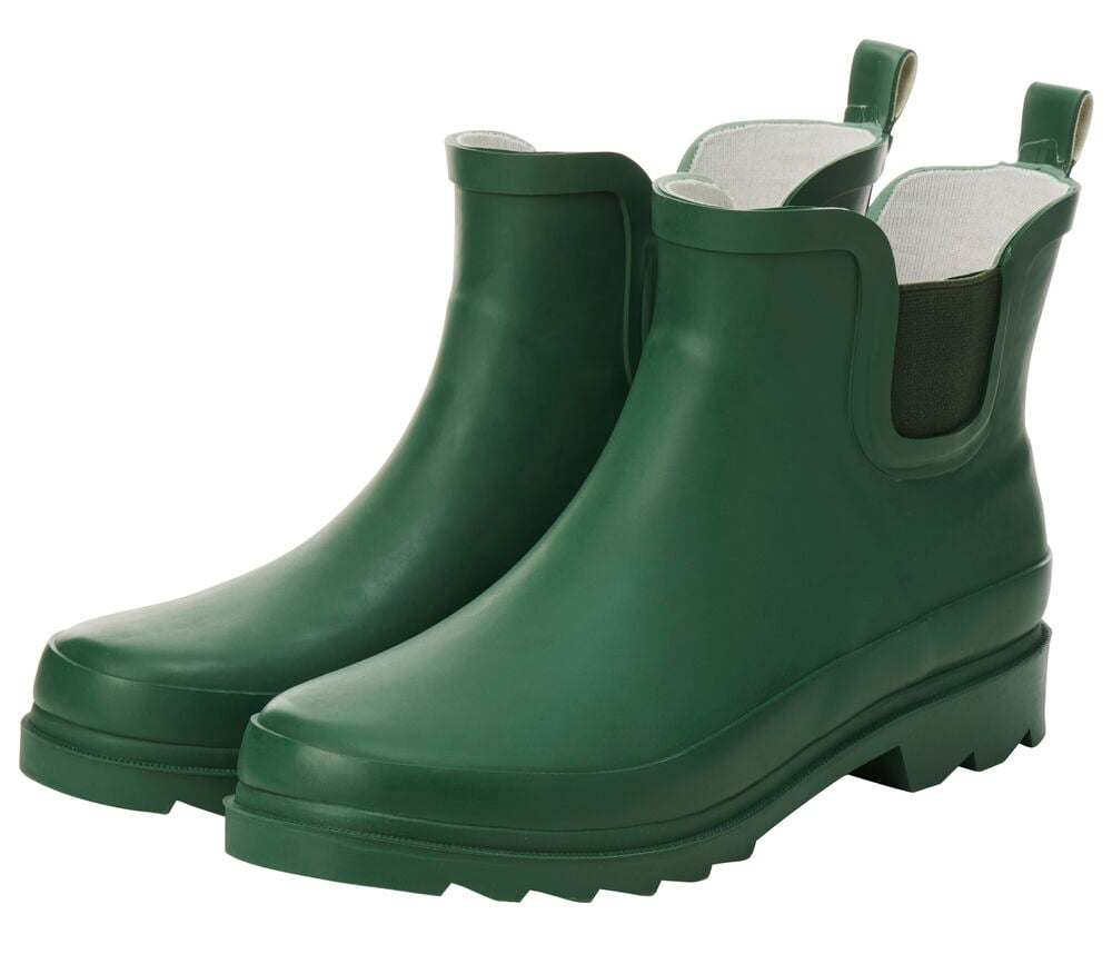 Vihreät kumisaappaat, joissa on joustavat sivupaneelit.