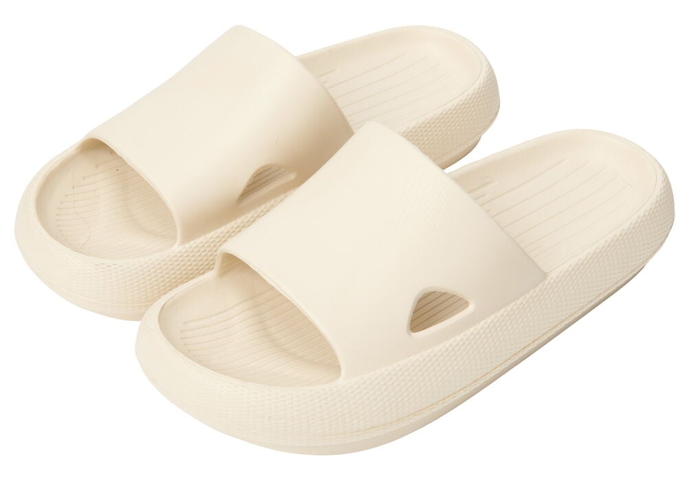 Beiga badtofflor i EVA material för dam.
