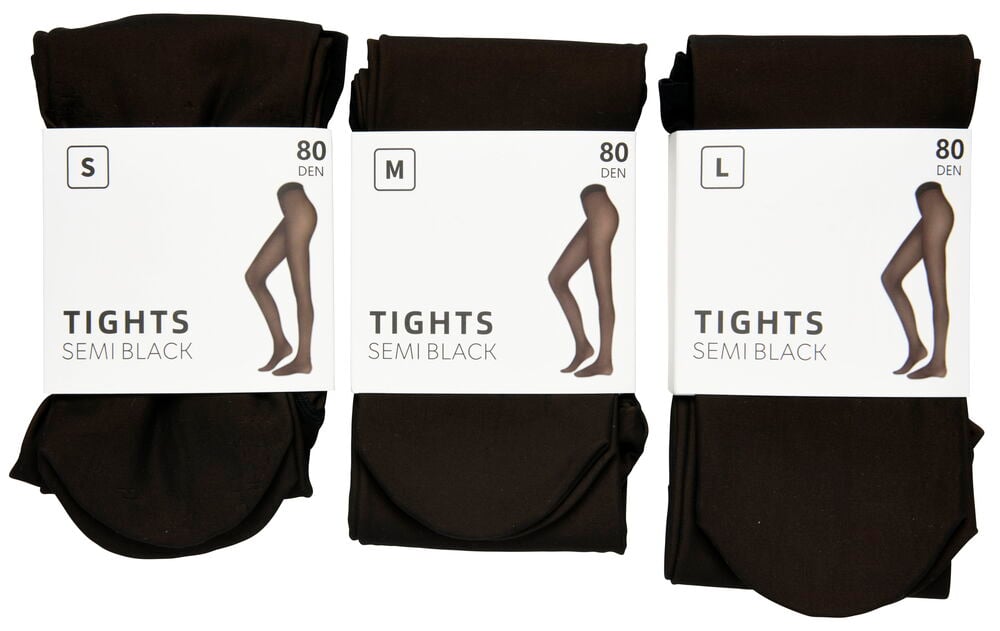 Kolme mustaa puolikiiltävää sukkahousuparia eri kokoisina.