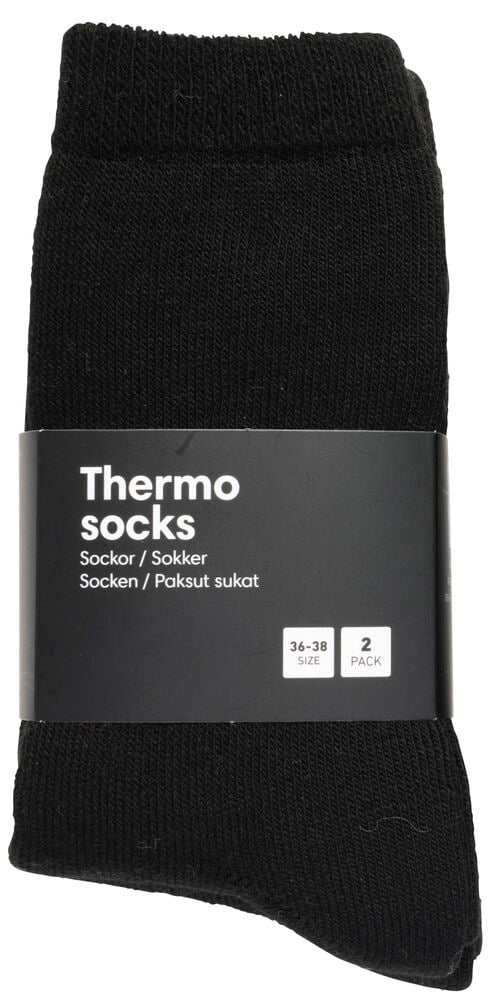 Svarta tjocka termostrumpor hopvikta i tvåpack.