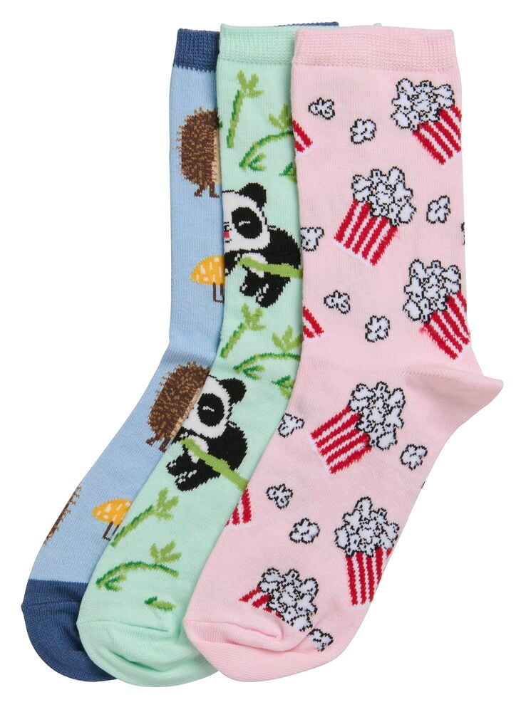 Strümpfe 1er-Pack Verschiedene Farben: hellblaue mit Igel, hellgrüne mit Panda, hellrosa mit Popcornmuster.
