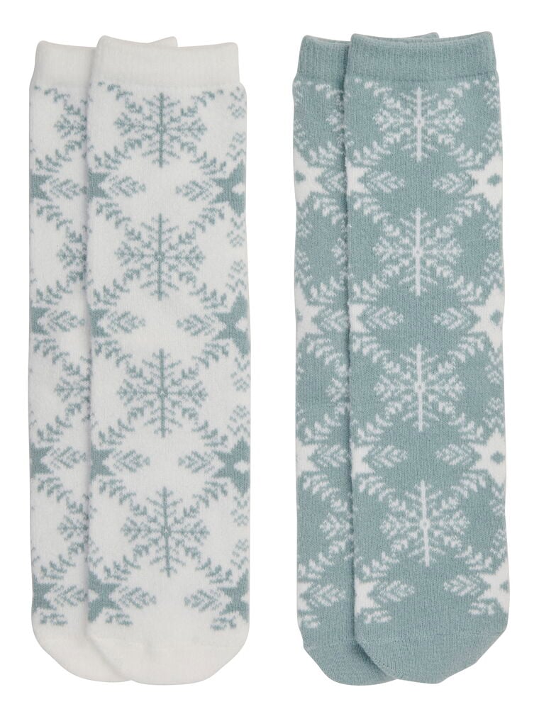 Zwei Paar Snowflake Strümpfe, ein weißes mit blauen Schneeflocken, ein blaues mit weißen Schneeflocken.