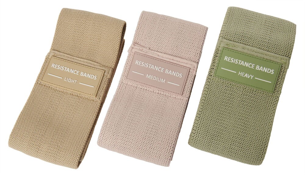 Tre träningsband i tyg med olika motstånd.