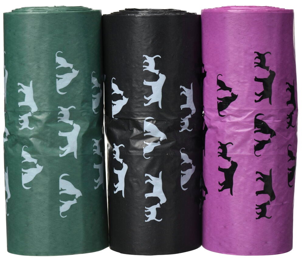 Tre rullar hundpåsar i olika färger och mönster.