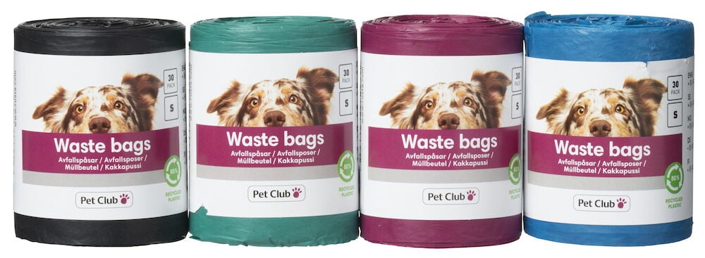 Fyra rullar hundpåsar i olika färger.