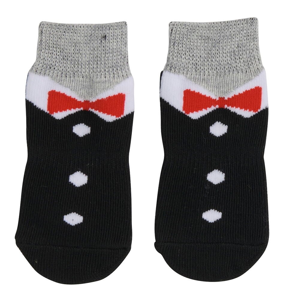 Ein Paar Baby-Tuxedosocken mit schwarzen Körpern, weißen Kragen, roten Fliegen und weißen Knöpfen.