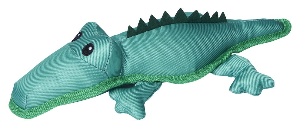 Grön hundleksak formad som krokodil i tyg.