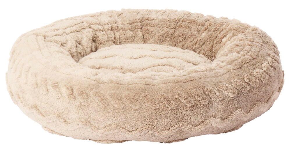 Rund beige djurbädd i mjuk polyester med struktur.