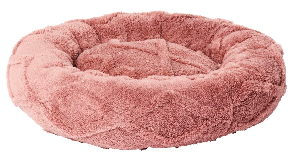 Rundes rosa weiches Tierbett aus Polyestergewebe.