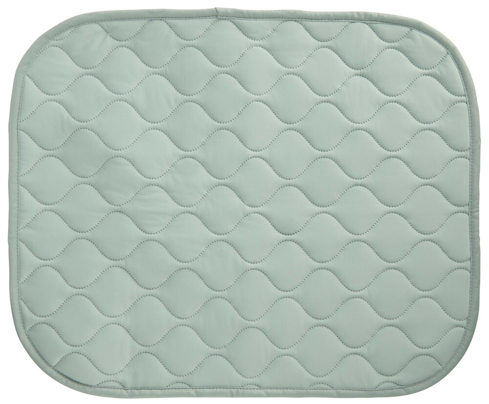 Grön kylmatta för hund med rundade hörn och vågigt kviltat mönster.