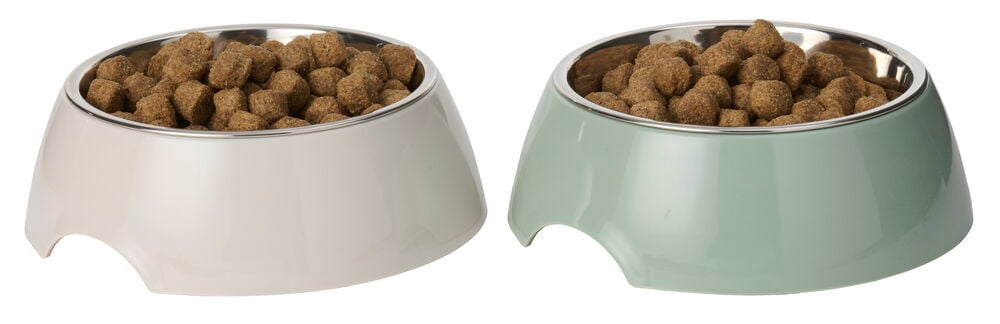 To 300 ml matskåler, en beige og en mintgrønn, med rustfrie innsatser, fylt med fôr.
