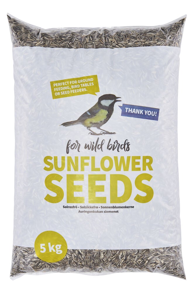 Stor plastpåse med solrosfrön för vildfåglar.