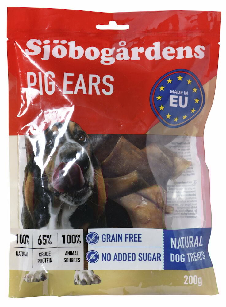 Påse med grisöron hundgodis och hund på framsidan.