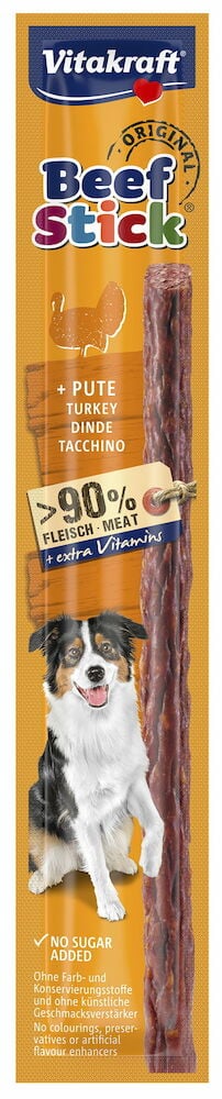 Orange verpackter Hundeleckerli-Stick mit Bild eines Hundes.