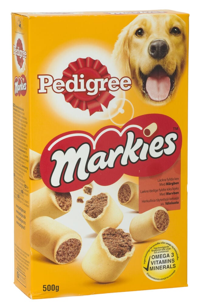 Koiran herkut Pedigree Markies 500g keltaisessa laatikossa, jossa on golden retriever ja luunmuotoisia täytettyjä keksejä.