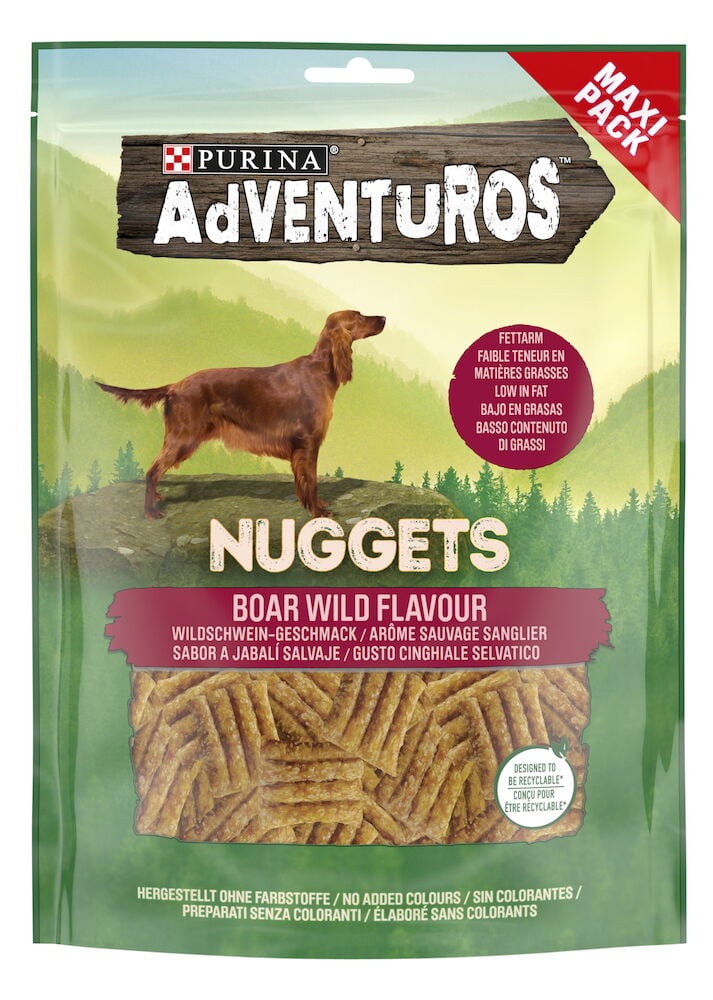 Grön påse med hundgodis nuggets och hundillustration.