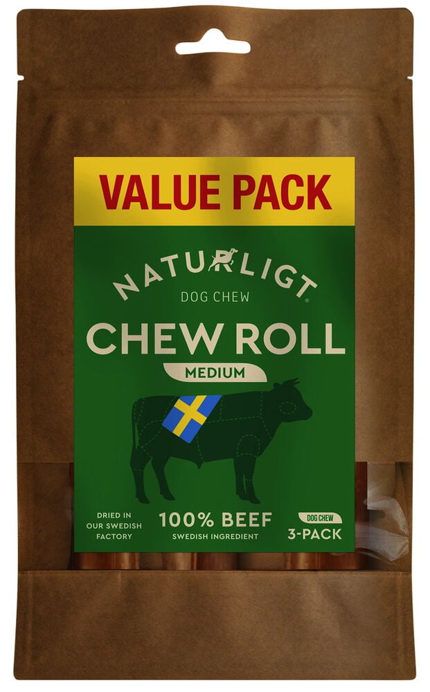 Brun påse med grönt hundgodis etikett.