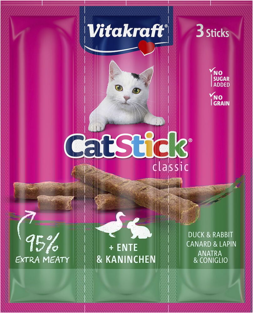 Tre rosa kattgodispinnar i förpackning med kattbild.