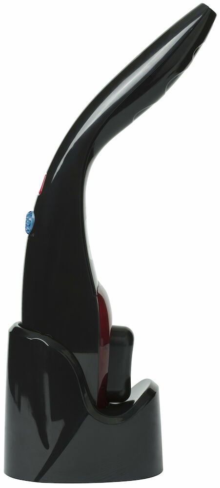 Svart massageapparat med laddningsstation sida vy.