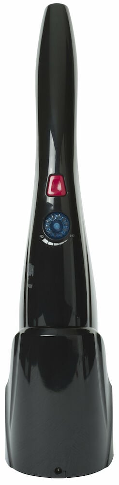 Svart massageapparat med knappar och laddningsstation.