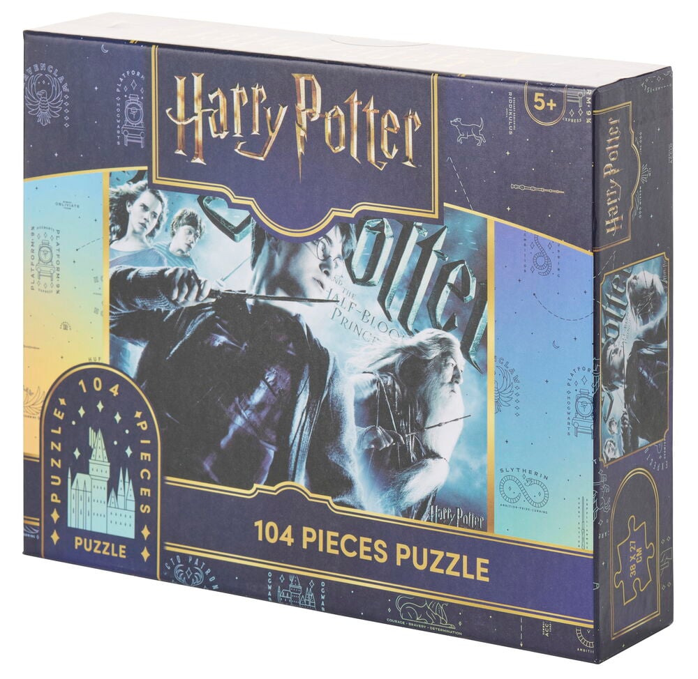Eine rechteckige Harry Potter 104-Teile Puzzlebox mit Filmfiguren auf einem dunkelblauen Hintergrund.