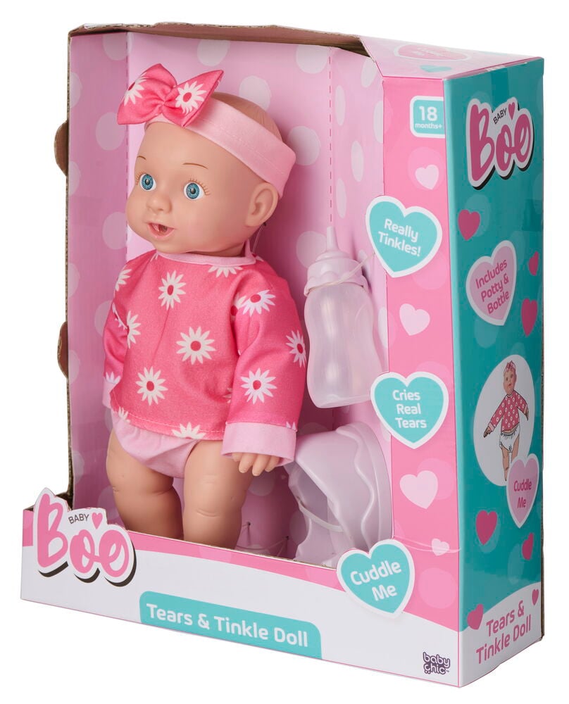 Baby Boo 30 cm Tears & Tinkle nukke yllään vaaleanpunainen päivänkakkarapaita, alushousut, hiuspanta, pullo ja potta.