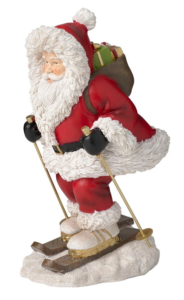 Skifahrende Weihnachtsmannfigur in rotem Anzug mit weißem Fell, hält goldene Skistöcke und braunen Geschenkesack.