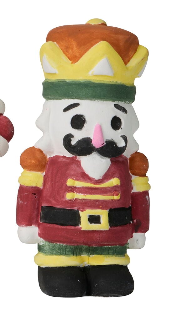 Eine bunte Weihnachtsnussknackerfigur, Teil eines Malerset 6er-Pack Weihnachten.