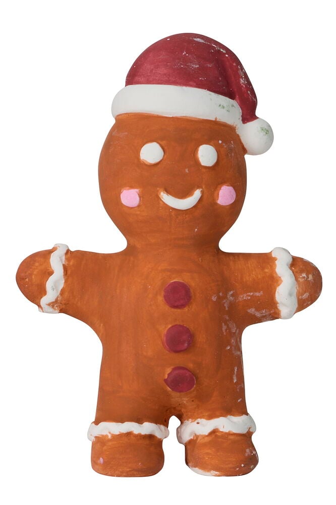 Eine braune Lebkuchenmannfigur mit roter Weihnachtsmütze, weißen Zuckergussdetails, rosa Wangen und roten Knöpfen.