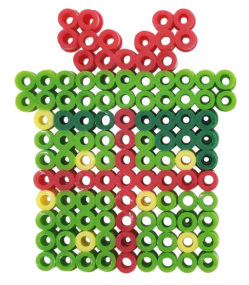 Perlenset XL Weihnachten, ein Geschenkpaket aus roten, grünen und gelben Kunststoffperlen mit roter Schleife.