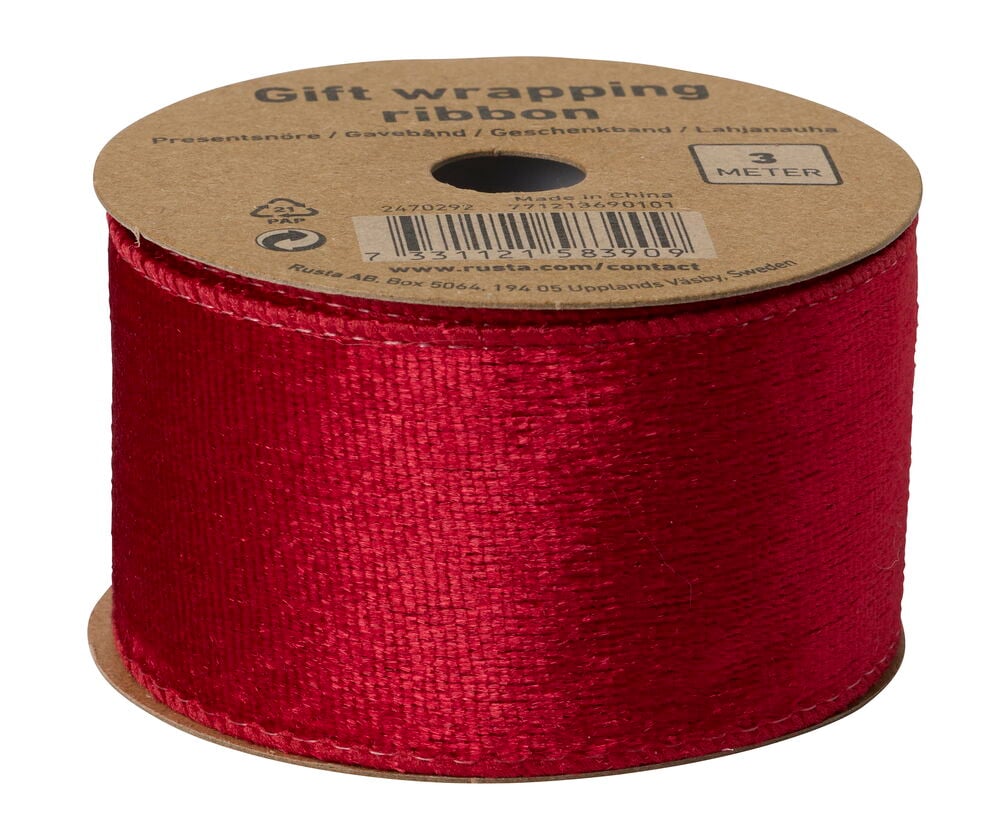 Ein rotes, texturiertes Geschenkband 3 m auf einer Spule, Nahansicht.