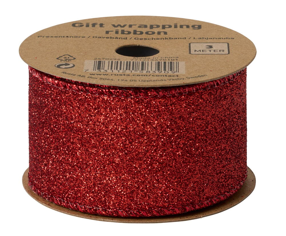 Rotes Glitzer Geschenkband 3 m auf einer braunen Pappspule, aus erhöhter Perspektive gesehen.