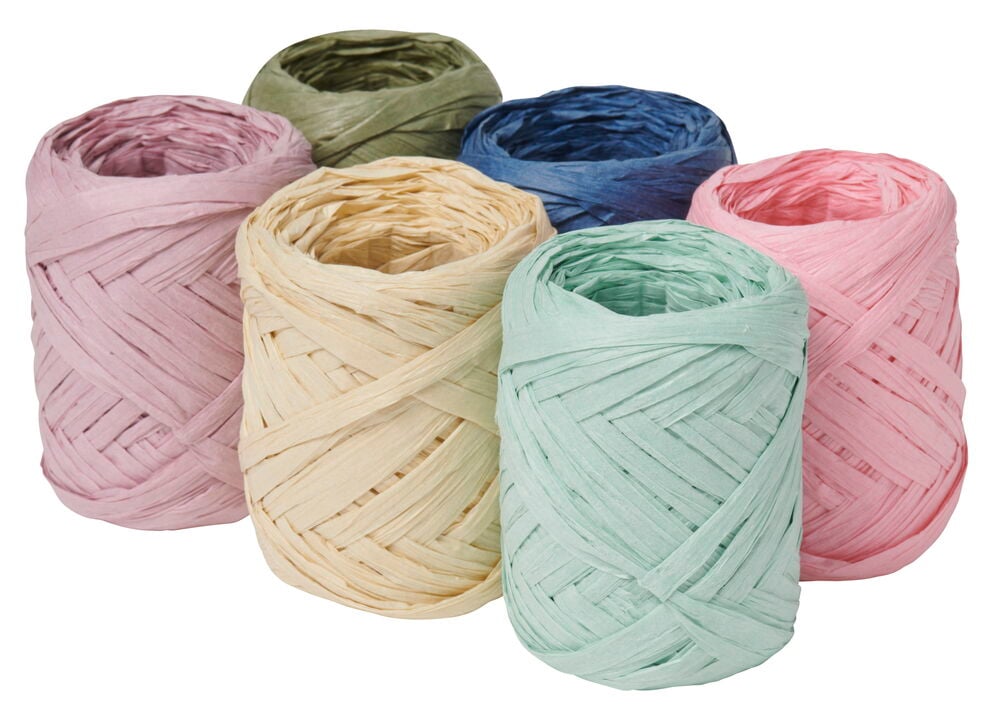 Kuusi rullaa lahjanarua eri pastelliväreissä.