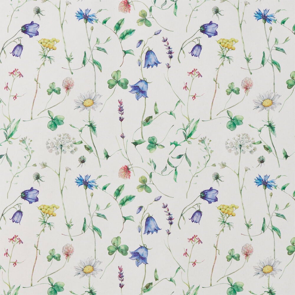 Vitt presentpapper med blommigt mönster och gröna blad.