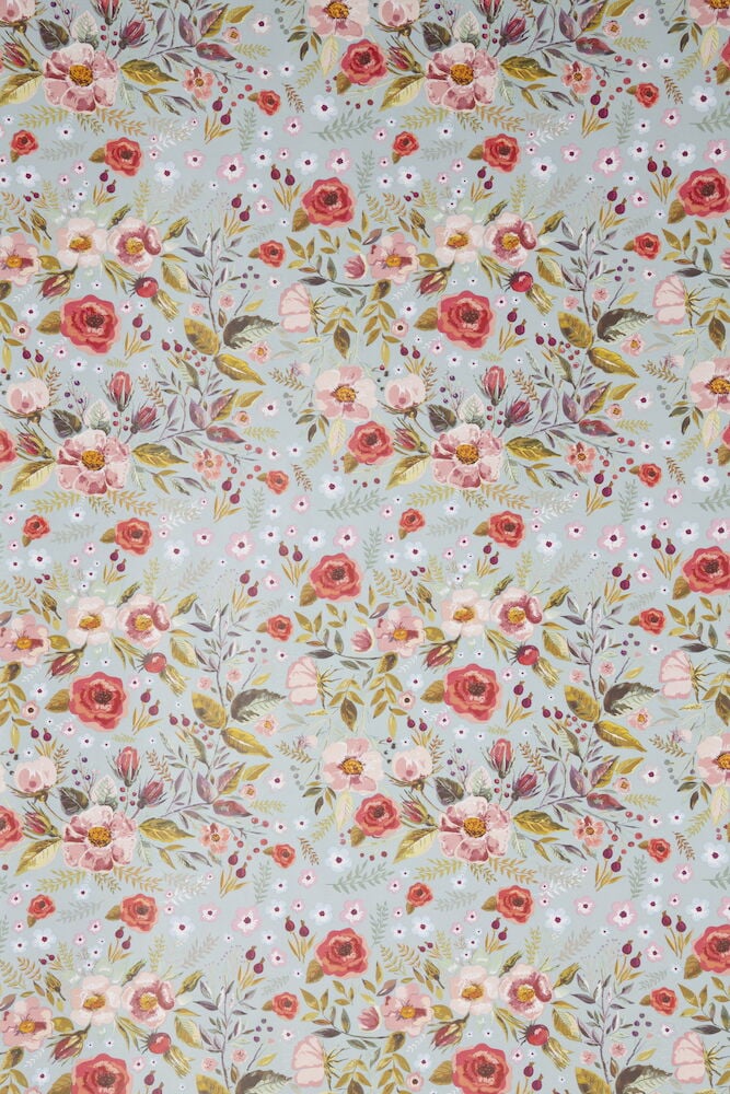 Blommigt presentpapper med röda och rosa blommor.