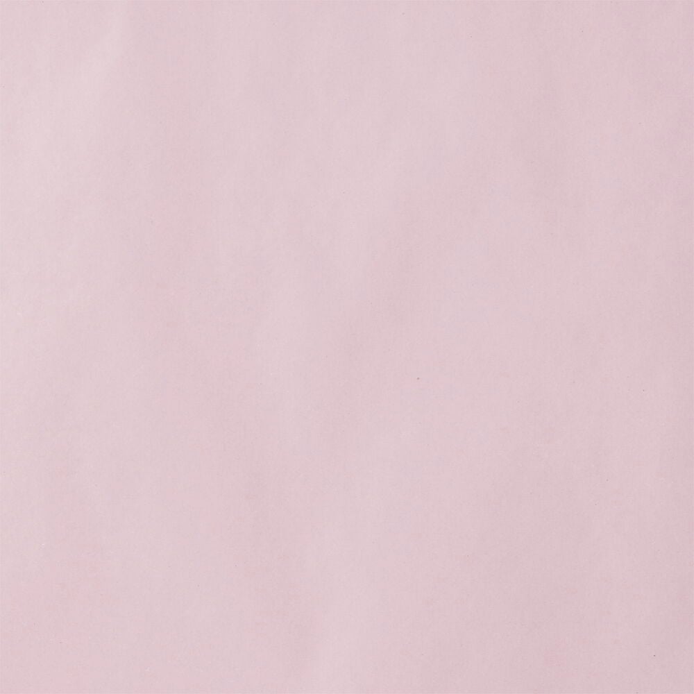 Vaaleanpunaista lahjapaperia, jossa on sileä yksivärinen pinta.