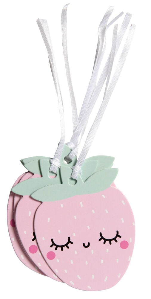 Vaaleanpunaisia mansikanmuotoisia tarroja, joissa on kasvot.