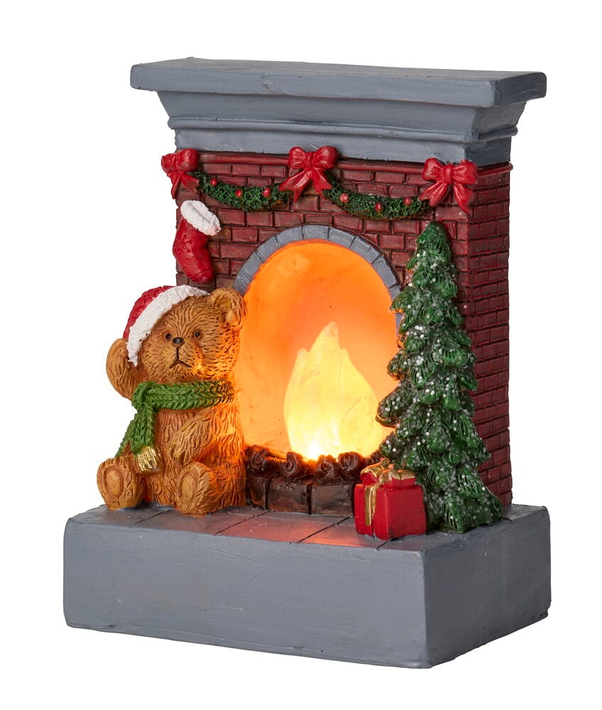 Zubehör für Wichteltür Weihnachten LED-Kamin-Szene mit Teddybär, Weihnachtsbaum, Geschenk und leuchtendem Feuer.