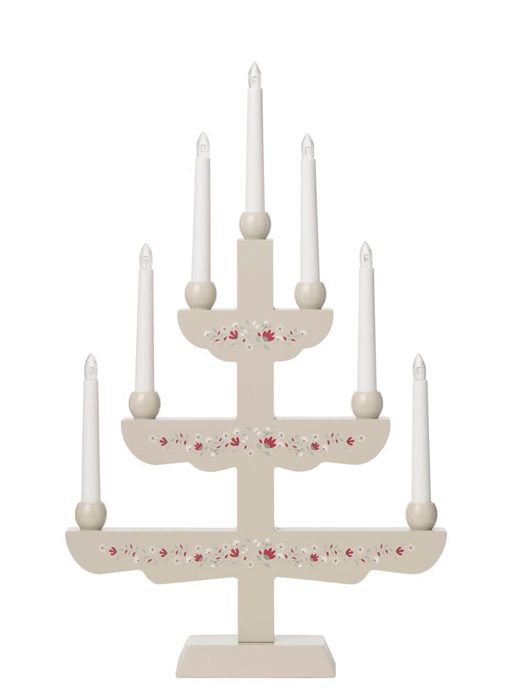 Beige 3-vånings elektrisk ljusstake med 7 vita ljus och rött och vitt blommönster.