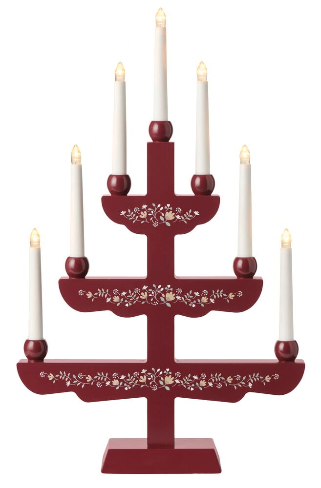 Röd, trappstegsformad adventsljusstake med sju vita LED-ljus och blomdekor.