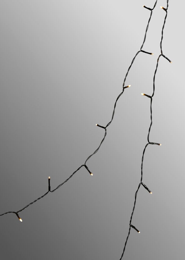 Ljusslinga Glänsa 8 m, 81 LED Varmvit, med en mörk kabel och små upplysta lysdioder.