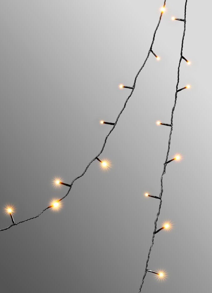 Ljusslinga Glänsa 5 m, 41 LED Varmvit med två slingor och lysande lampor mot en grå bakgrund.