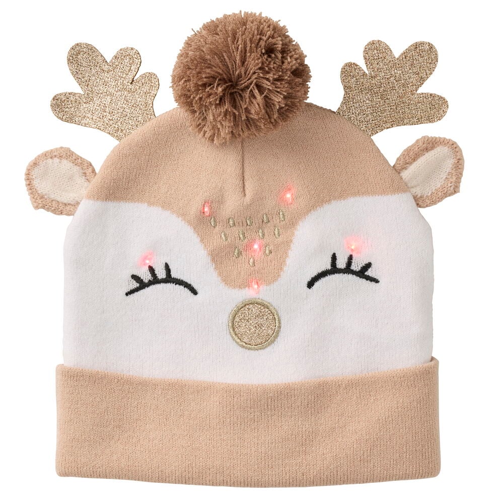 Vorderansicht einer beige-weißen Strick-Mütze LED mit Rentiergesicht, leuchtenden rosa LEDs, Glitzergeweih und braunem Bommel.