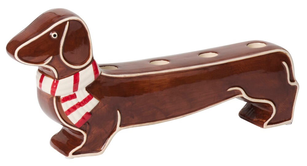 Ljusstake Pup Brun, en brun keramik-taxljusstake med tre ljushållare och en randig halsduk.