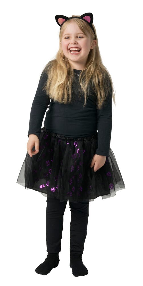Barnets svarta Maskeradset: katthårsband, tyllkjol med lila tassavtryck, långärmad topp och leggings.