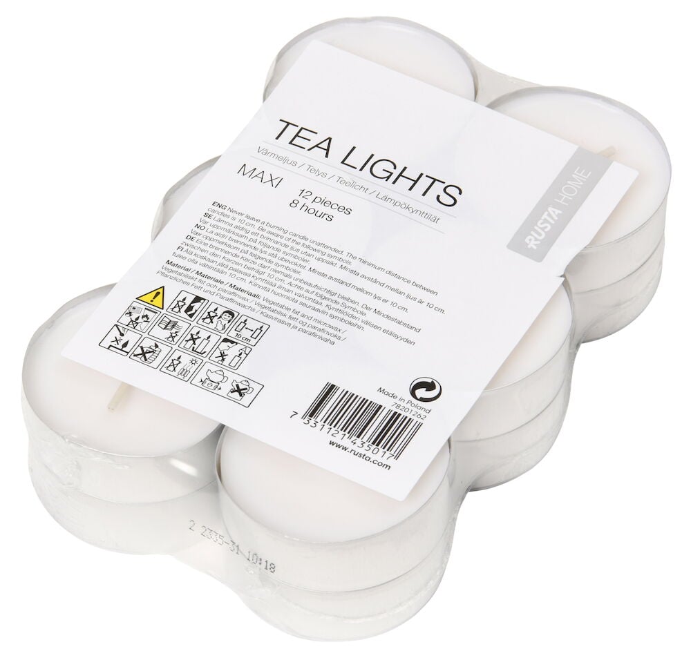 Tolv vita värmeljus maxi i plastförpackning.