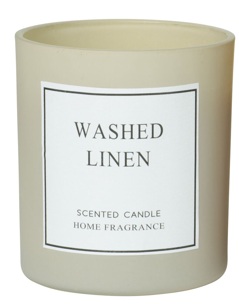 Beige duftlys i glass med etikett Washed Linen.