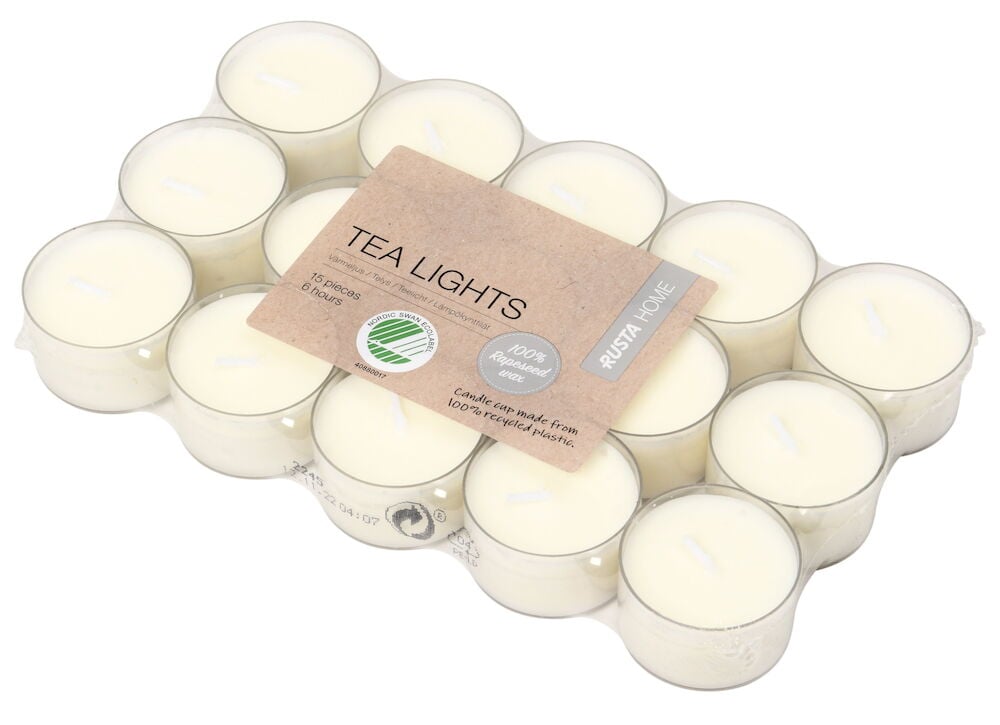 Femton vita värmeljus i transparent plastförpackning.