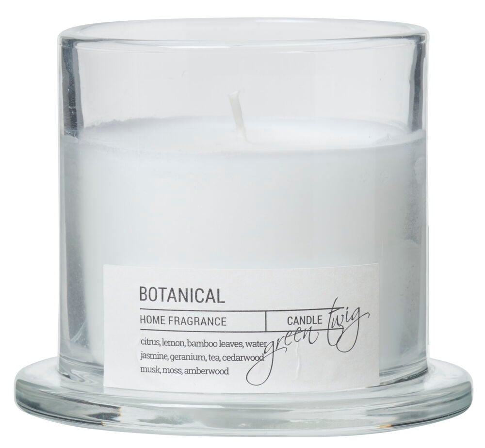 Vitt doftljus i genomskinlig glasburk med lock.